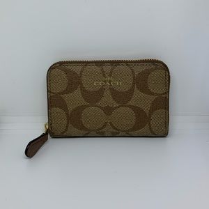COACH zip around coin case